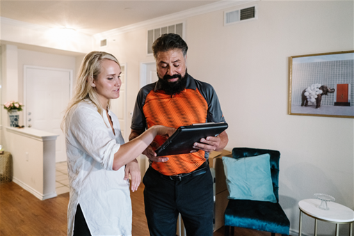 Two People with writing pad